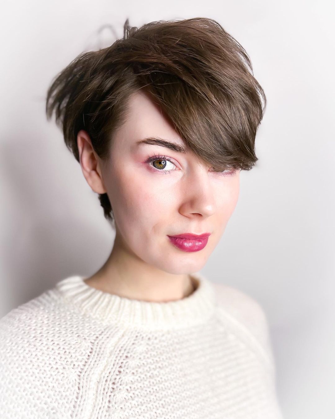 Long Pixie Cut with Stacked Layers Voluminous Pixie Bob with Swooping Bangs