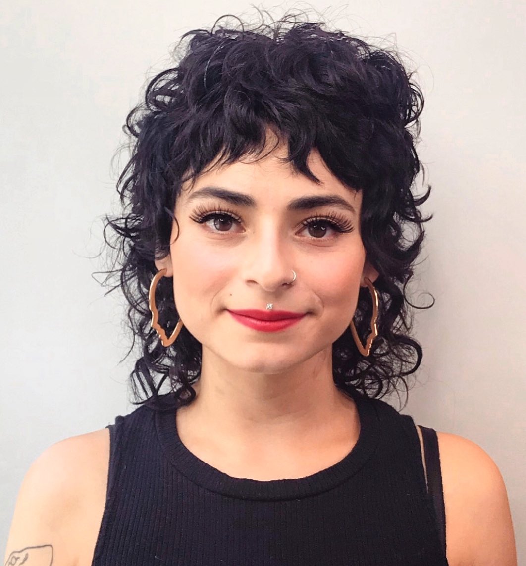 Short Wolf Cut for Wavy Hair Short Wavy Wolf Cut with Baby Bangs