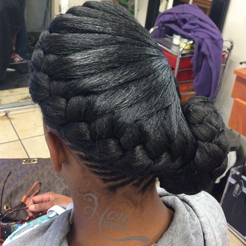 black asymmetrical side braided bun updo