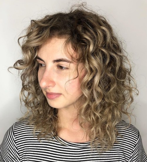 Medium Layered Cut With Blonde Highlights