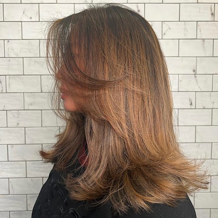 Medium-Length Feathered Cut