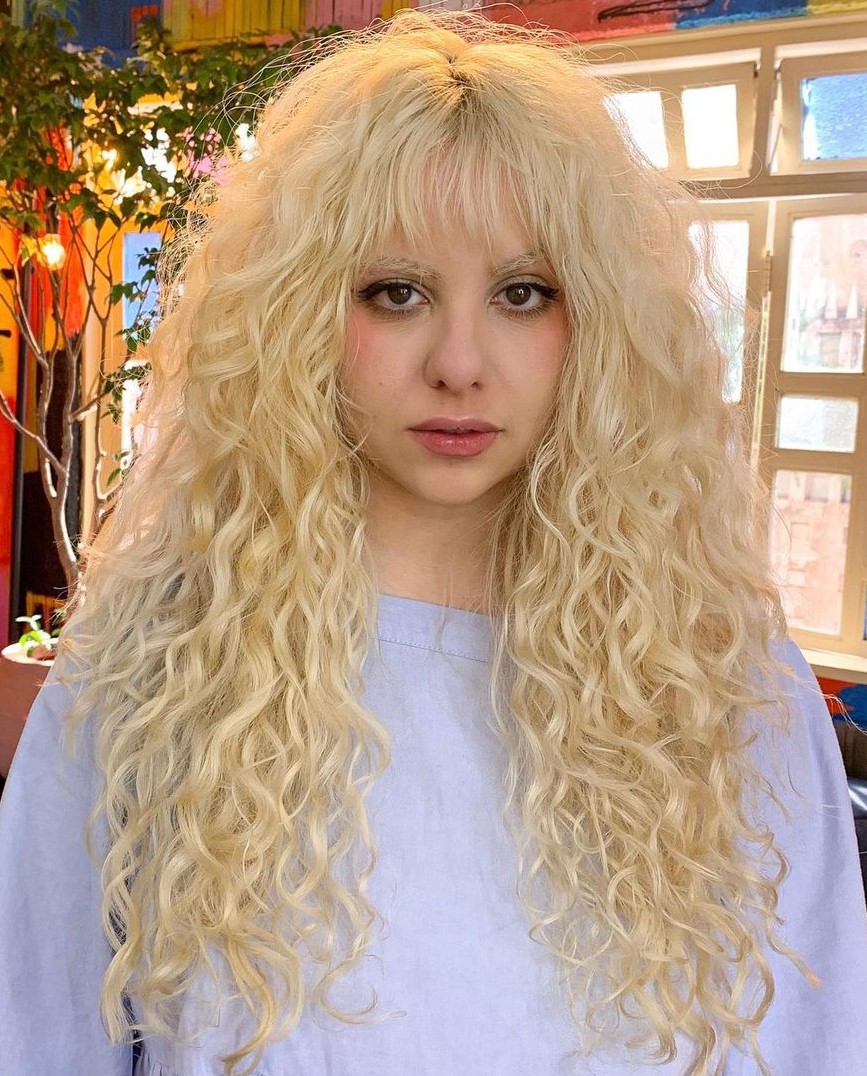 Blonde Layered Wolf Cut Long Light Blonde Hair with Shaggy Layers and Bangs