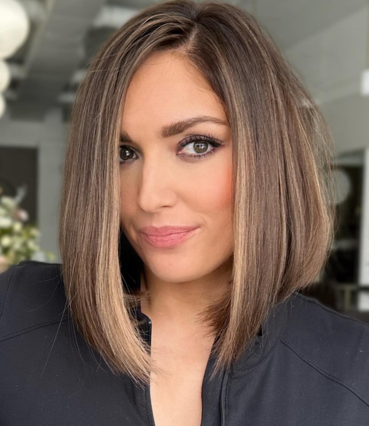 Side Parted Sleek Medium Length Hairstyle