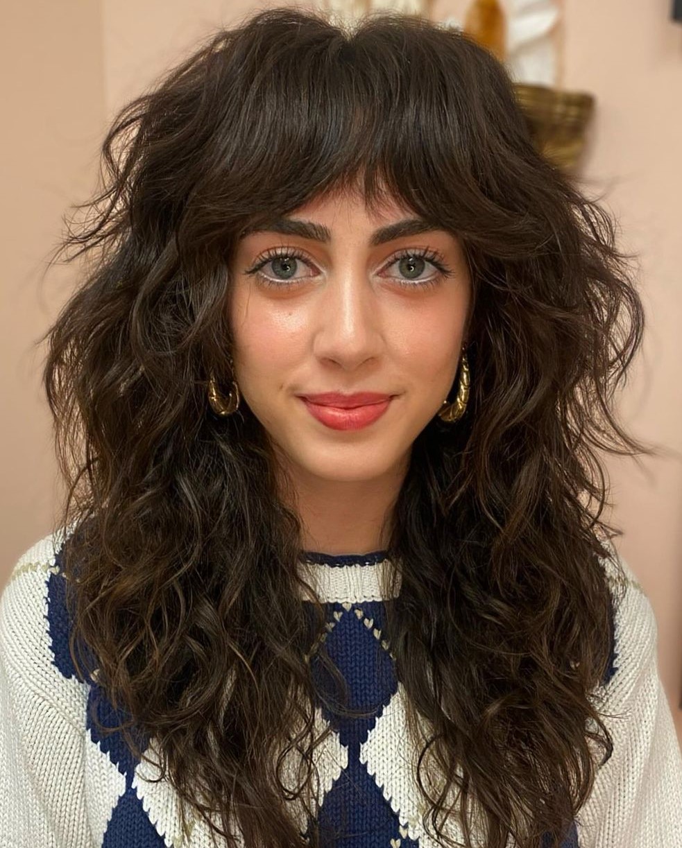 Wolf Cut for Thick Wavy Hair Voluminous Wolf Cut on Thick Wavy Hair