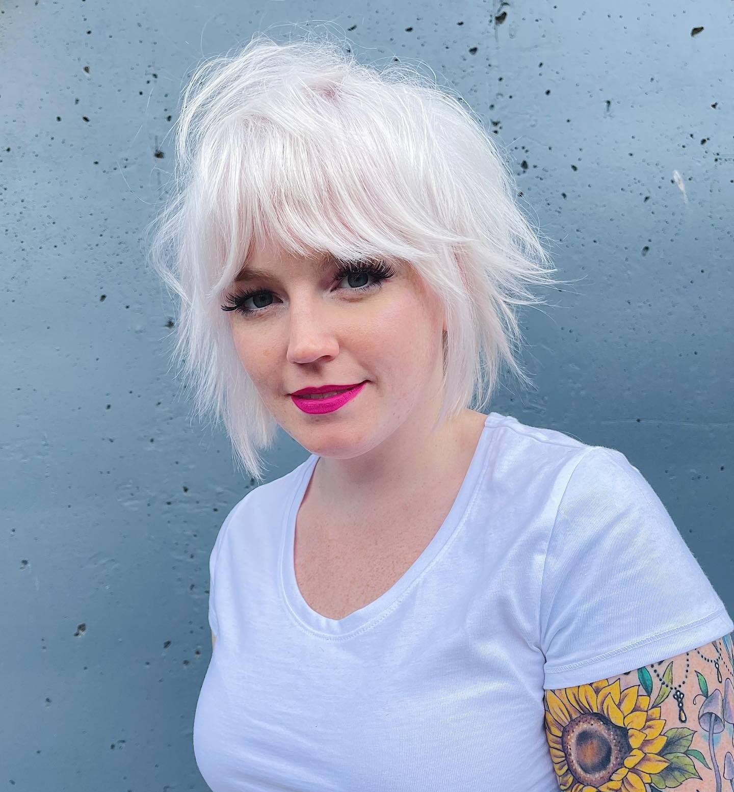 Short Razor Cut Hair Bright Blonde Textured Bixie Cut