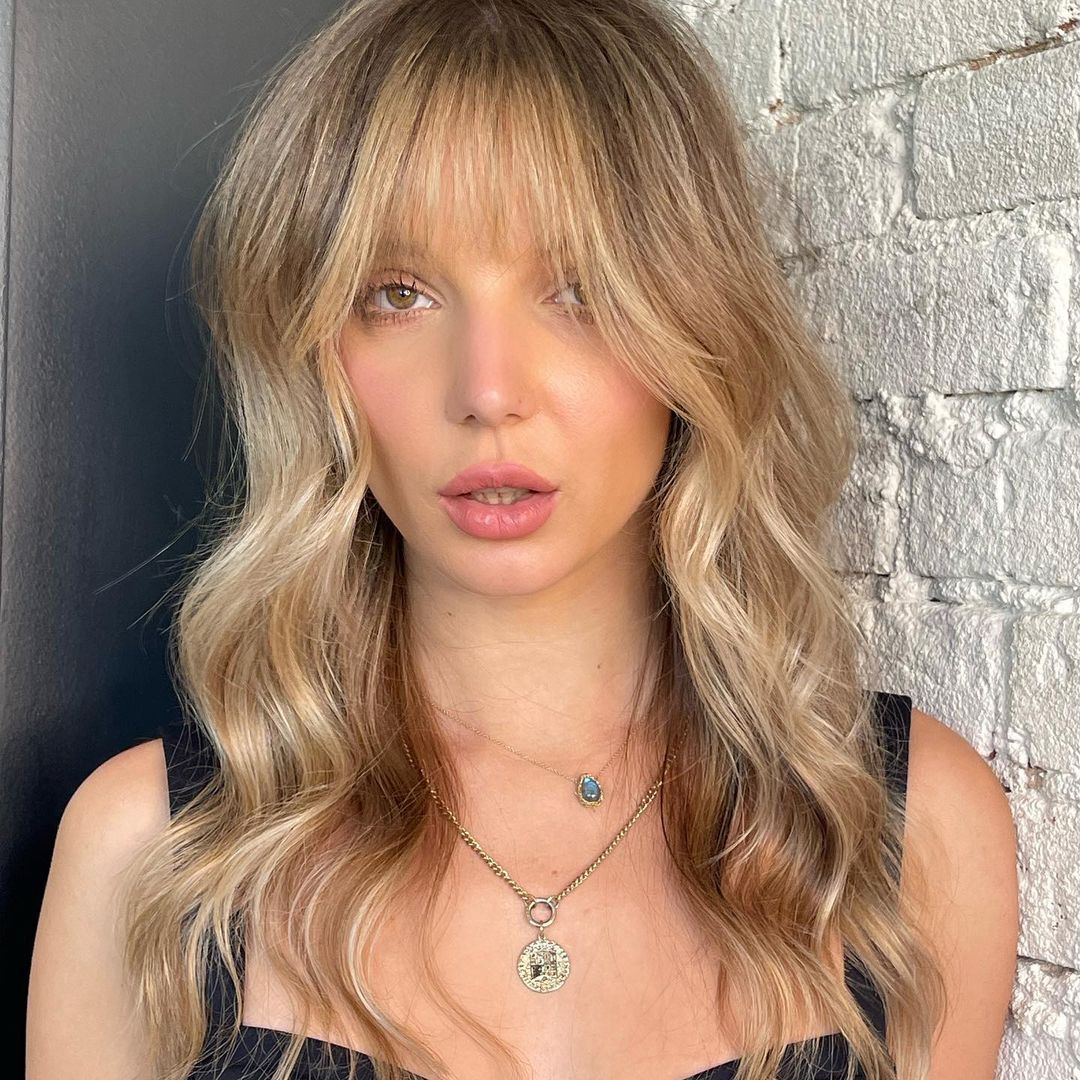 French Bangs Tousled Blonde Waves with French Bangs