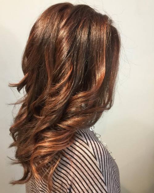 medium length wavy auburn balayage hair
