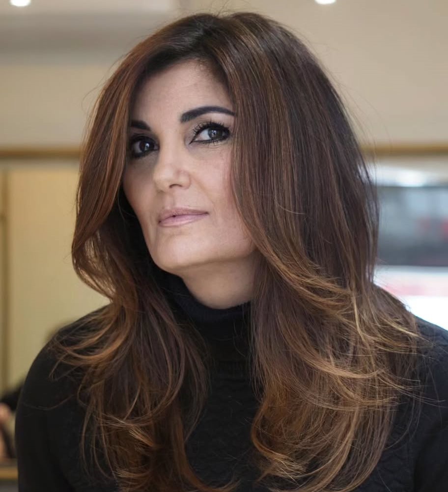 Mid-Length Layered Cut for Women Over 50