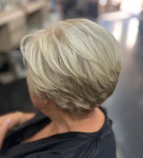 Short Feathered Silver Blonde Hairstyle