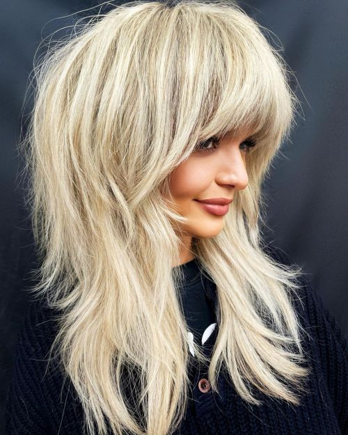 Voluminous Wolf Haircut Blonde Shaggy Wolf Cut for Thick Hair