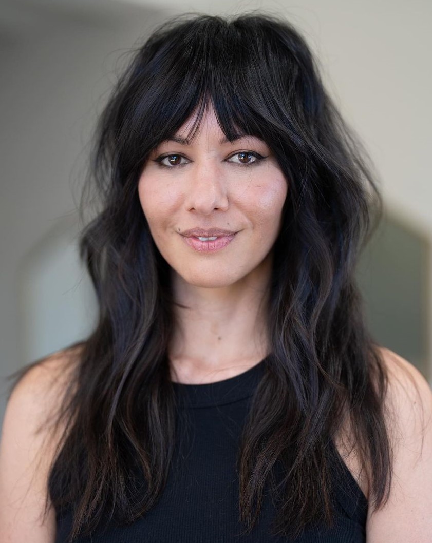 Subtle Wolf Hairstyle Soft Long Shag with Bottleneck Bangs