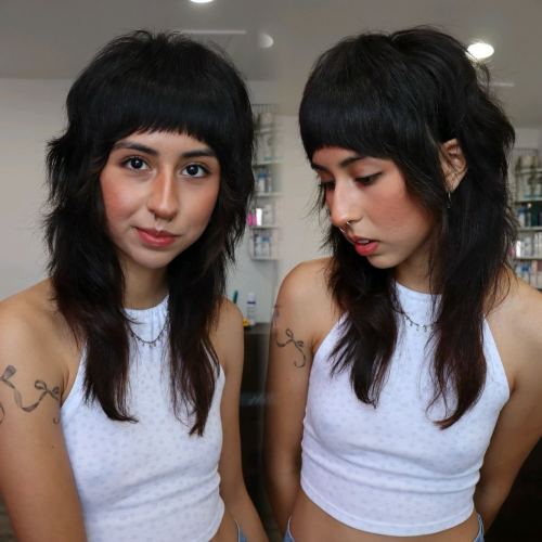 Wolf Haircut with Arched Bangs