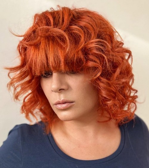 Copper Curls with Long Blunt Bangs Curly Bob with Blunt Bangs