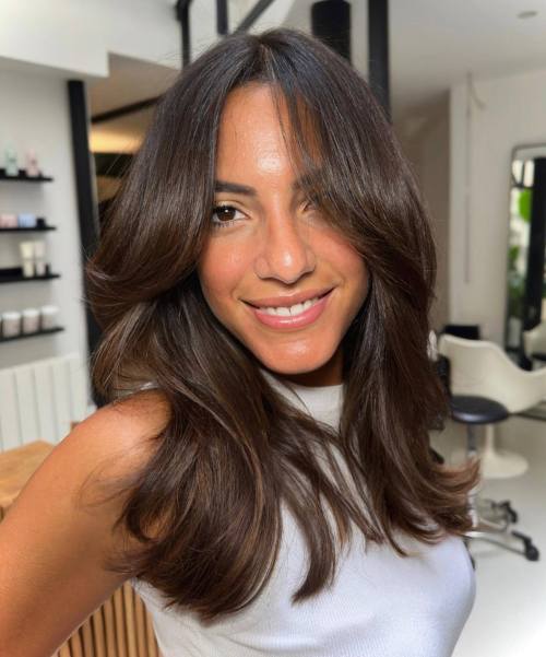 Polished Cheek Grazing Curtain Bangs