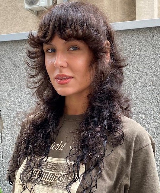 Wolf Cut with Flippy Layers Long Wavy Wolf Cut with Flipped Up Bangs