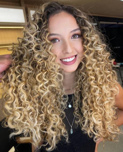 Soft Long Natural Curls with Golden Blonde Highlights