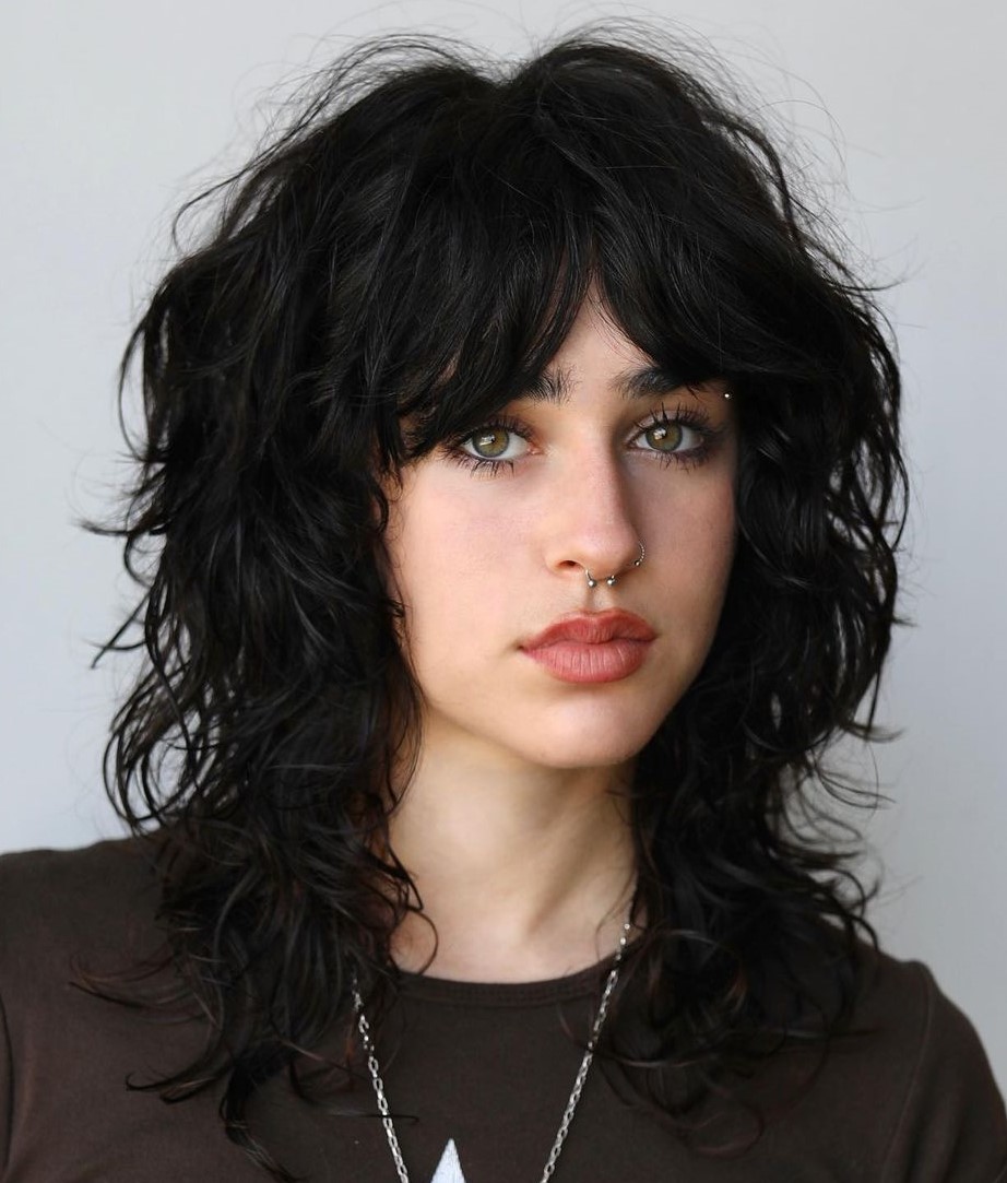 Dramatic Wolf Cut for Black Hair Wolf Cut with Curtain Bangs on Medium Wavy Hair