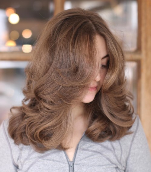 Center Parted Voluminous Medium Haircut