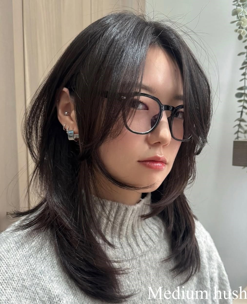 Medium-Length Hush Haircut with Bangs