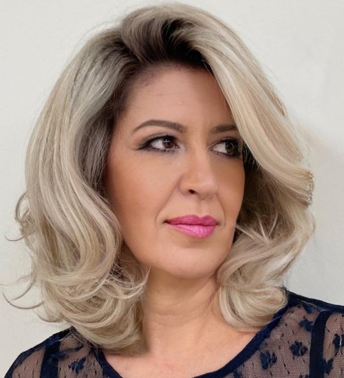Shoulder Length Hair Blowout Mid Length Blonde Cut with Darker Roots and Blowout Volume