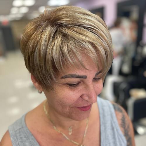 50 Plus Rounded Blonde Pixie With Silver Highlights